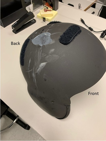 Impact marks on top of the pilot’s helmet (Source: SAG, with TSB annotations)