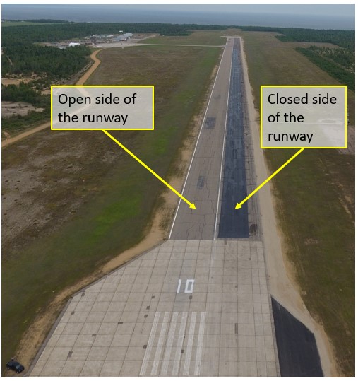 Aerial photo of Runway 10 at the Baie-Comeau Airport during the rehabilitation work on the south side of the runway in June 2018 (Source: Baie-Comeau Airport, with TSB annotations)