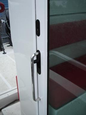 Photo 3 - Looking aft at the starboard door handle and latch (installed upside down)
