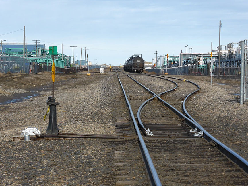 Subdivision track on left; track RA28 on right with loaded tank cars