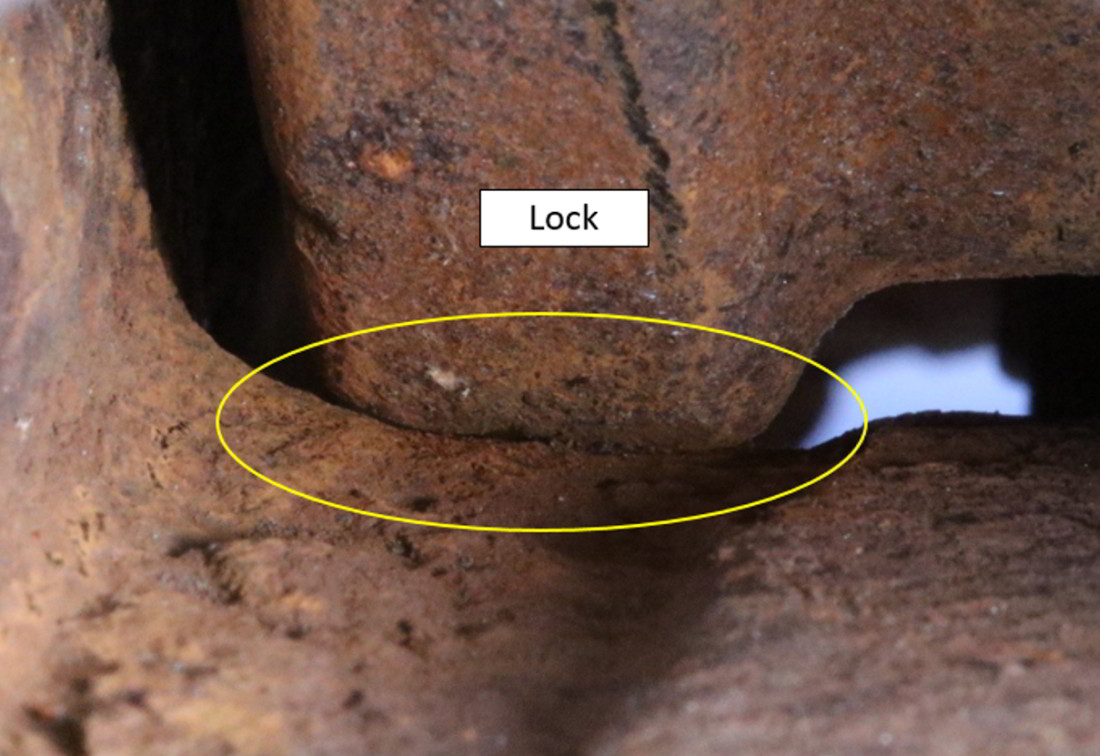   Interference between the lower corner of the lock and the back    of the locking hole (Source: TSB)