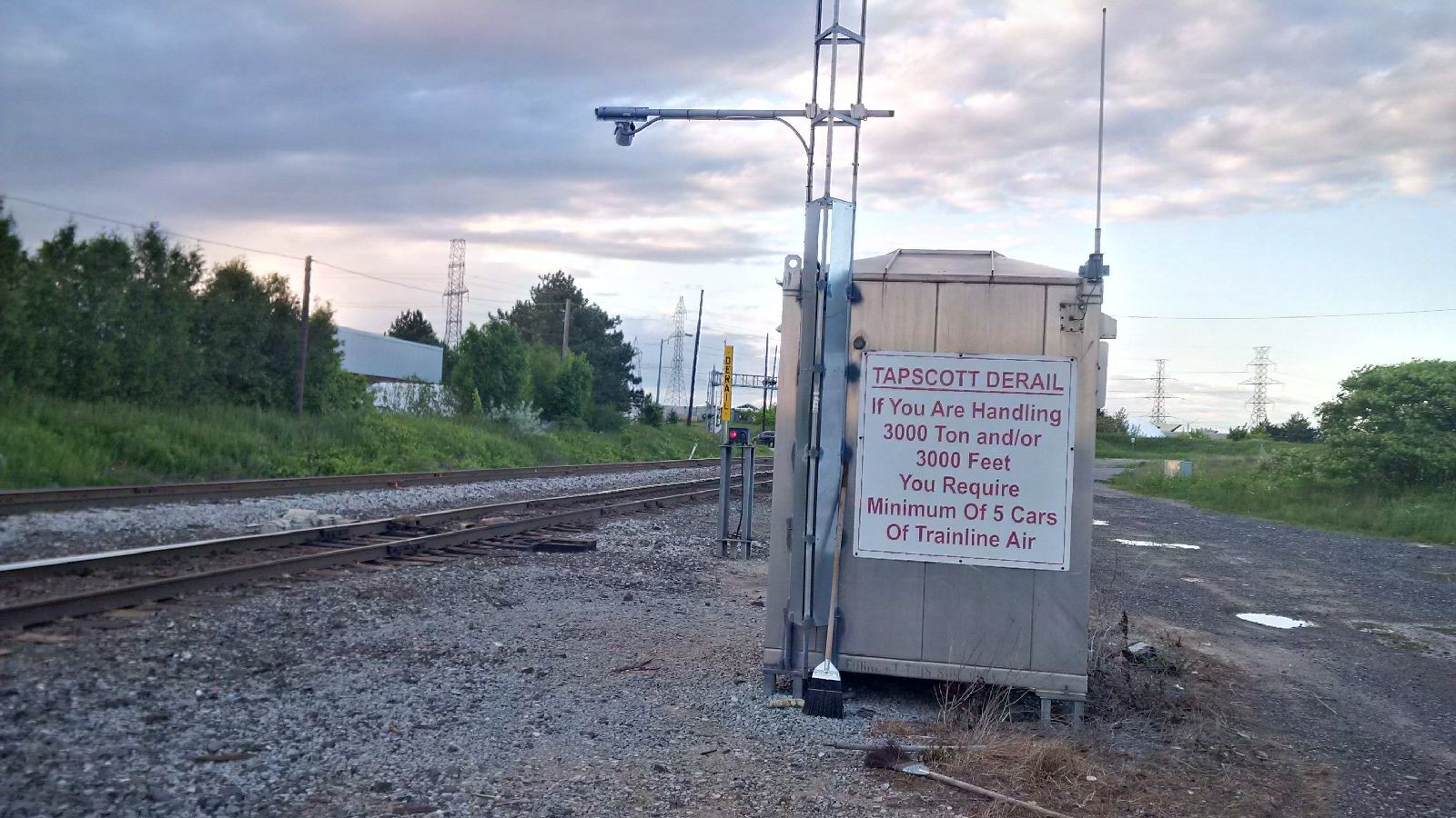 Sign on signal bungalow near the Tapscott Road crossing (Source: TSB)
