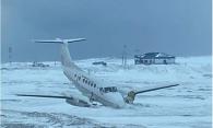 Figure 3. The occurrence aircraft after the runway excursion, stopped with the nose down (Source: Keewatin)