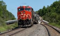 Figure 2. View of tail-end locomotive and derailed cars (Source: Canadian National Railway Company)